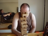DJ Sasha F ponders Jenga, while I read in the background
